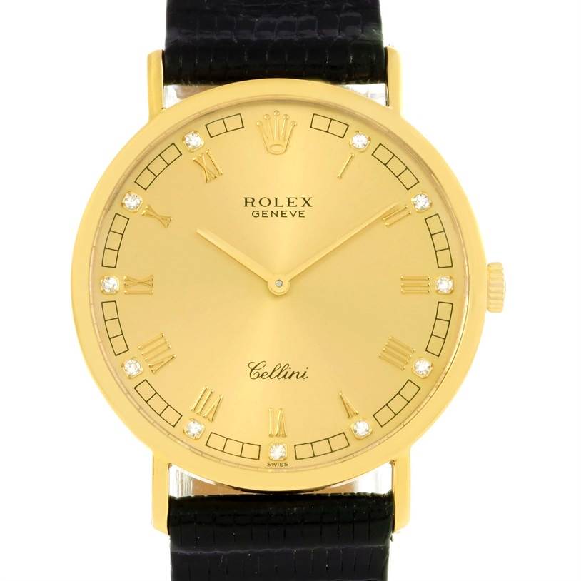 The image shows a front view of a Rolex Cellini 5112 Men's Yellow Gold Champagne Dial 5112 Men's Yellow Gold Champagne Dial watch with a gold dial and black leather strap.