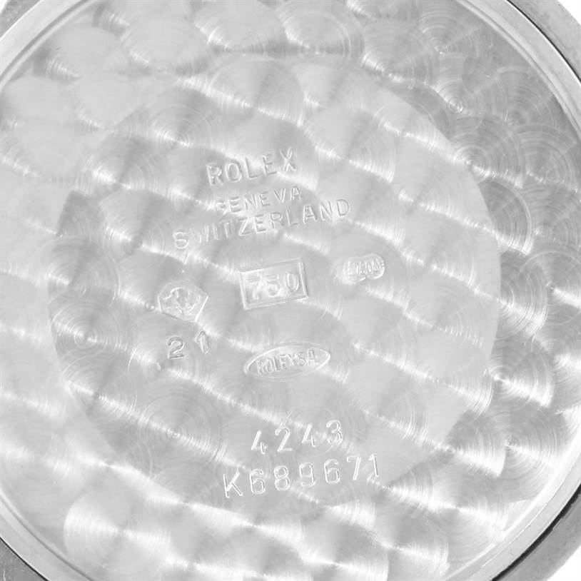 The image shows the inside case back of a Rolex Cellini 4243 Men's White Gold Black Dial 4243 Men's White Gold Black Dial model, displaying engravings and hallmarks.