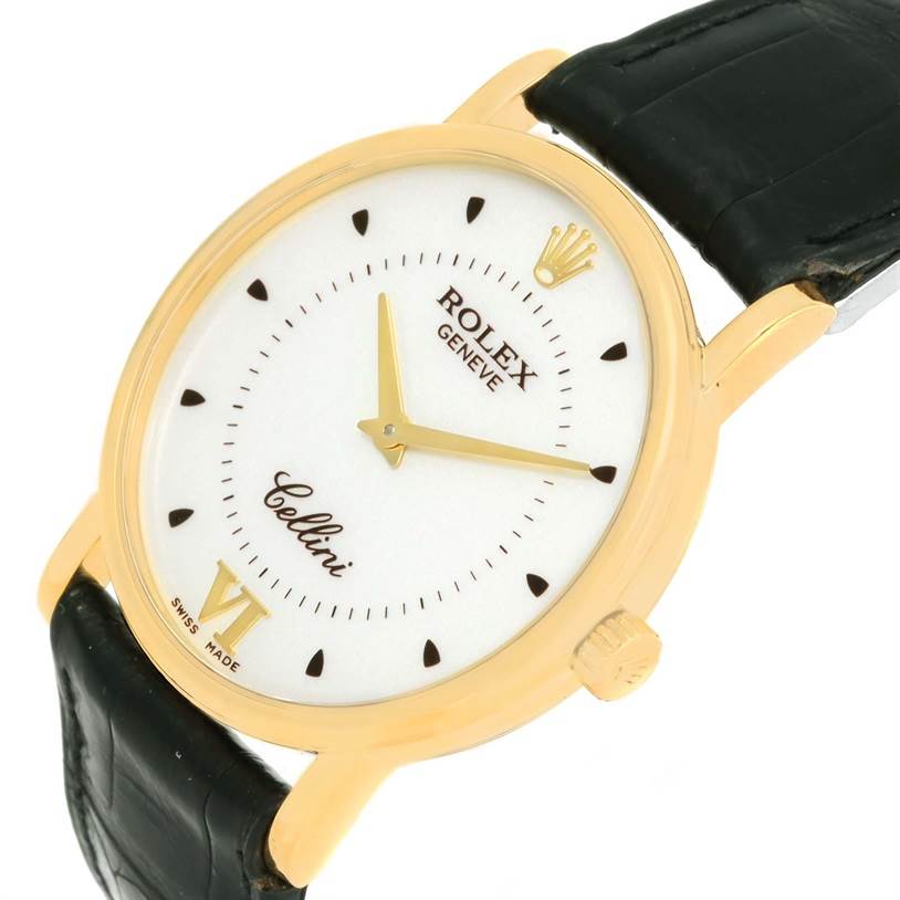 The image shows the front of a Rolex Cellini 5115 Yellow Gold Silver Dial 5115 Yellow Gold Silver Dial watch, highlighting its dial, hands, crown, and part of the leather strap.
