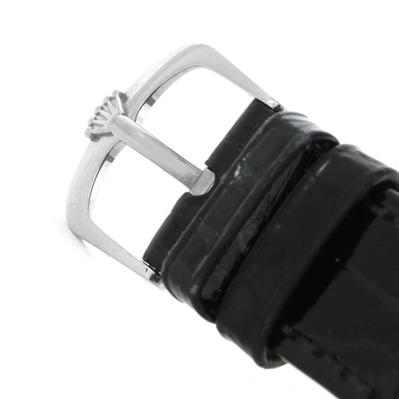 The image shows the clasp and part of the leather strap of a Rolex Cellini 50509 Men's White Gold White Dial 50509 Men's White Gold White Dial watch from a close-up angle.