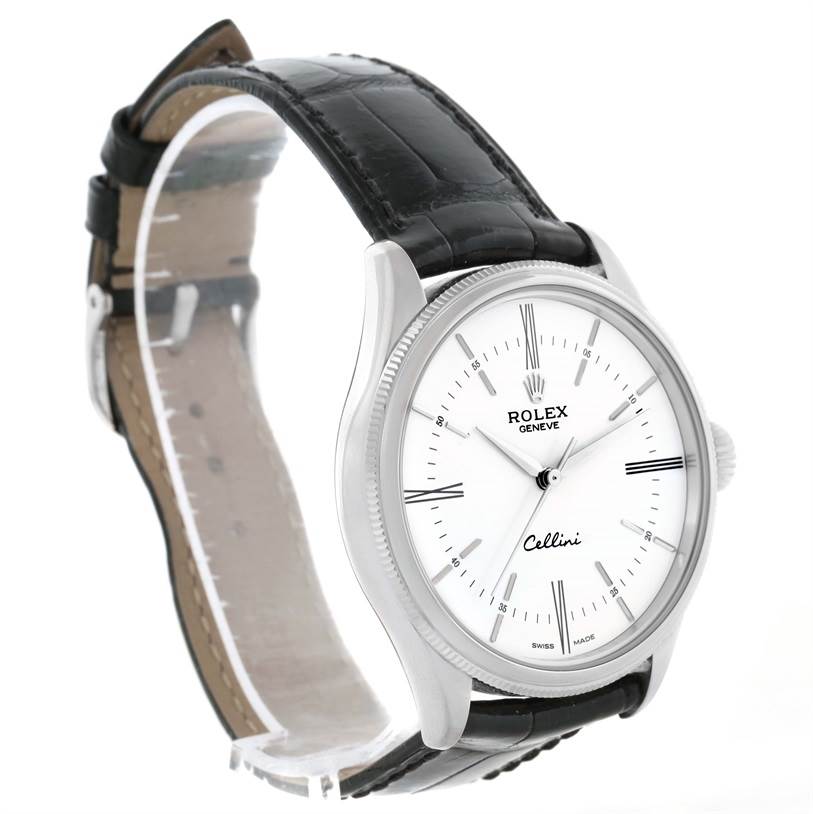 The Rolex Cellini 50509 Men's White Gold White Dial 50509 Men's White Gold White Dial watch is shown at an angle revealing the face, case, crown, and leather strap.