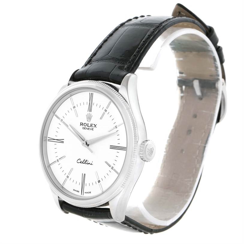 The Rolex Cellini 50509 Men's White Gold White Dial 50509 Men's White Gold White Dial watch is shown at an angle displaying its face, crown, and leather strap.