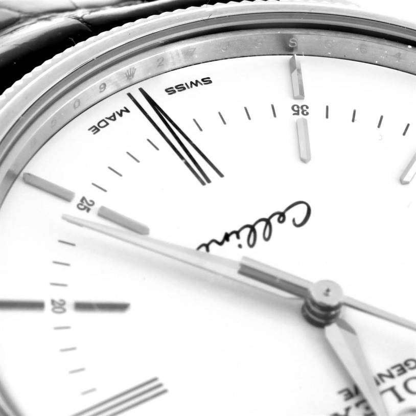 The image shows a close-up angle of the Rolex Cellini 50509 Men's White Gold White Dial 50509 Men's White Gold White Dial watch face, highlighting the hour markers, "Cellini" logo, and part of the hands.