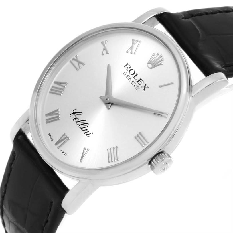 The Rolex Cellini 5115 White Gold Silver Dial 5115 White Gold Silver Dial watch is shown at a slight angle, highlighting its face, dial, crown, and leather strap.