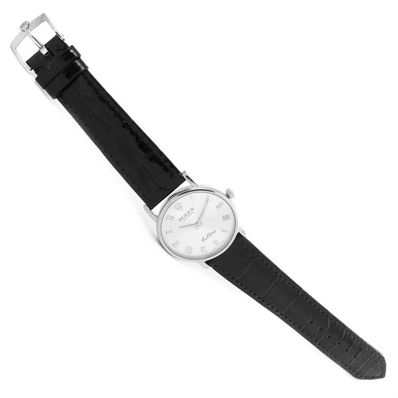 The image shows a Rolex Cellini 5115 White Gold Silver Dial 5115 White Gold Silver Dial watch from a top-down angle, displaying the watch face, black leather strap, and buckle.