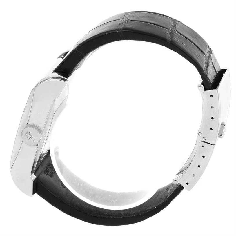 The image shows a side view of the Rolex Cellini 5443 Men's White Gold Black Dial 5443 Men's White Gold Black Dial watch, highlighting the crown, case, and leather strap with its buckle.