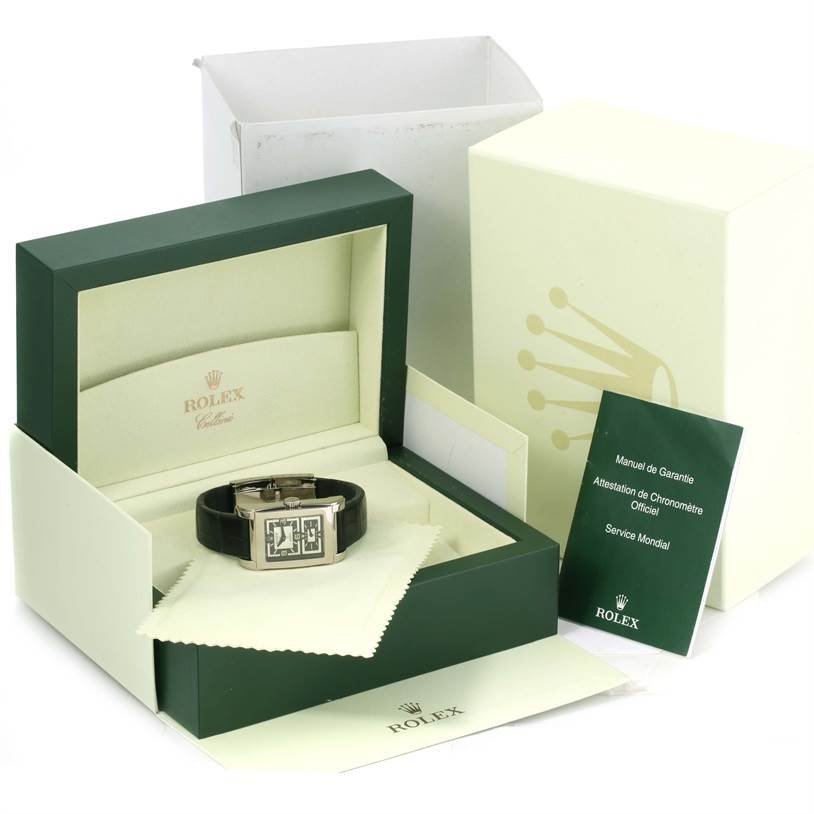 This image shows a Rolex Cellini 5443 Men's White Gold Black Dial 5443 Men's White Gold Black Dial watch in an open green box, with manuals and outer packaging visible.