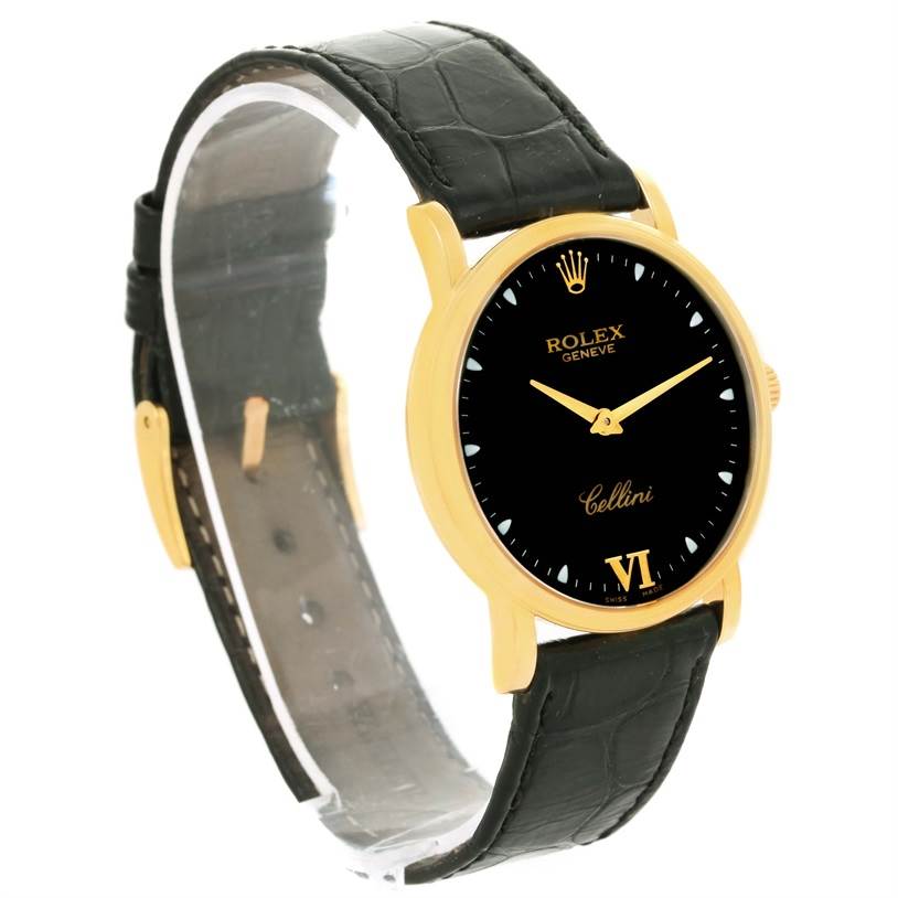 This image shows a Rolex Cellini 5115 Men's Yellow Gold Black Dial 5115 Men's Yellow Gold Black Dial watch at a slight angle, highlighting the black dial, gold case, and black leather strap.