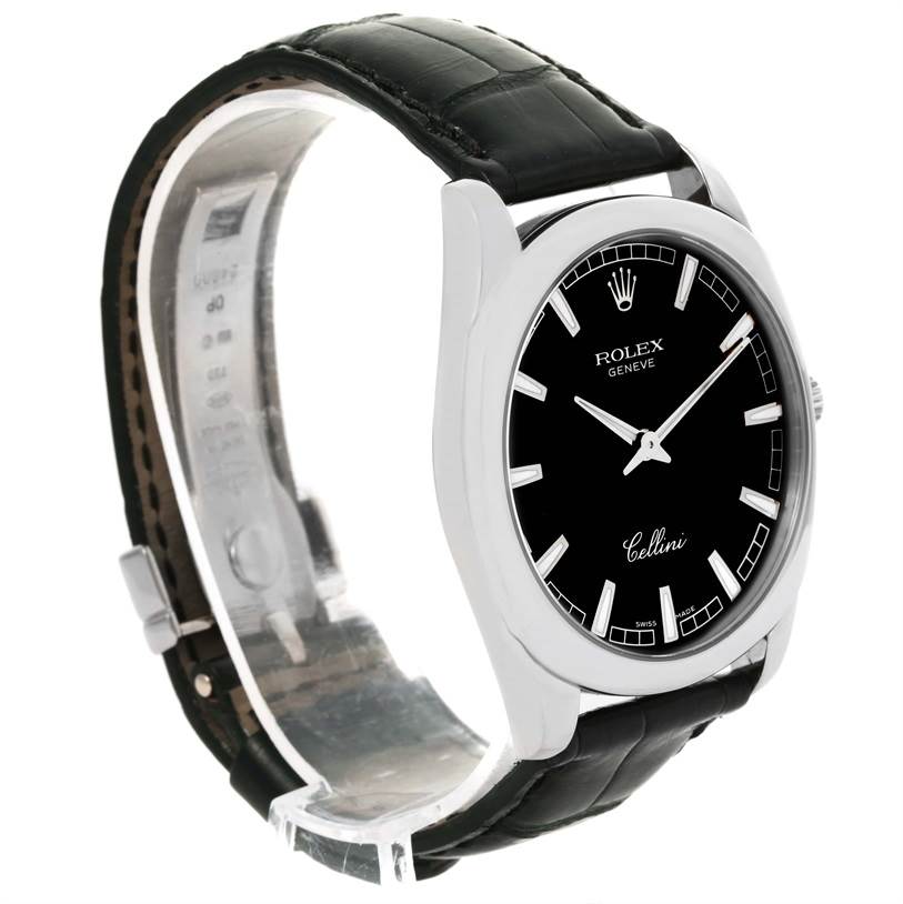 The image shows a Rolex Cellini 4243 Men's White Gold Black Dial 4243 Men's White Gold Black Dial watch from an angled side view, displaying its black dial, silver hands, and black leather strap.