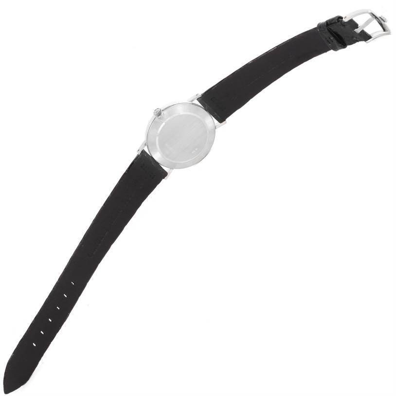 The image shows the back and side view of a Rolex Cellini 4112 Men
s White Gold Silver Dial 4112 Men
s White Gold Silver Dial watch, including the watch case, crown, and black leather strap.