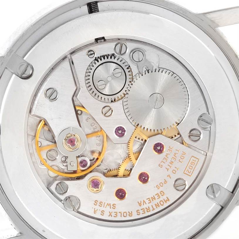 The image shows the intricate inner mechanical components of a Rolex Cellini 5115 Men's White Gold Silver Dial 5115 Men's White Gold Silver Dial watch from a back angle.