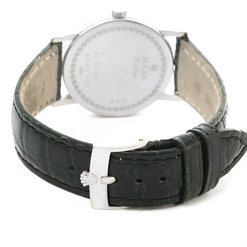 This image shows the back view of the Rolex Cellini 5115 Men's White Gold Silver Dial 5115 Men's White Gold Silver Dial watch, highlighting its strap and clasp.