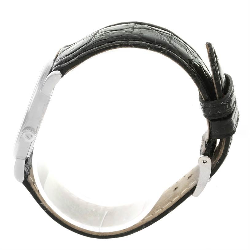 The image shows a Rolex Cellini 5115 Men's White Gold Silver Dial 5115 Men's White Gold Silver Dial watch from a side angle, displaying its leather strap and part of the case and buckle.