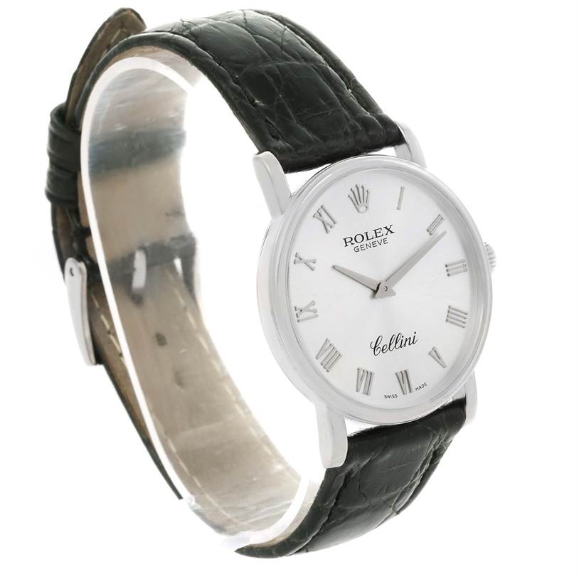 This image shows a side angle of the Rolex Cellini 5115 Men's White Gold Silver Dial 5115 Men's White Gold Silver Dial watch, highlighting its white dial, Roman numerals, and black leather strap.