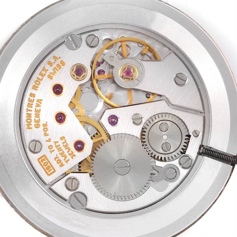 The image shows the inner mechanical movement of a Rolex Cellini 4112 Men's Yellow Gold Champagne Dial 4112 Men's Yellow Gold Champagne Dial model watch from a top-down perspective.