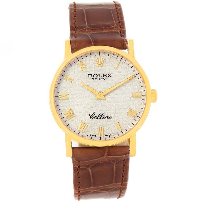 The Rolex Cellini 5115 Men
s Yellow Gold Beige Dial 5115 Men
s Yellow Gold Beige Dial watch is shown from the front angle, displaying its face, case, and leather strap.