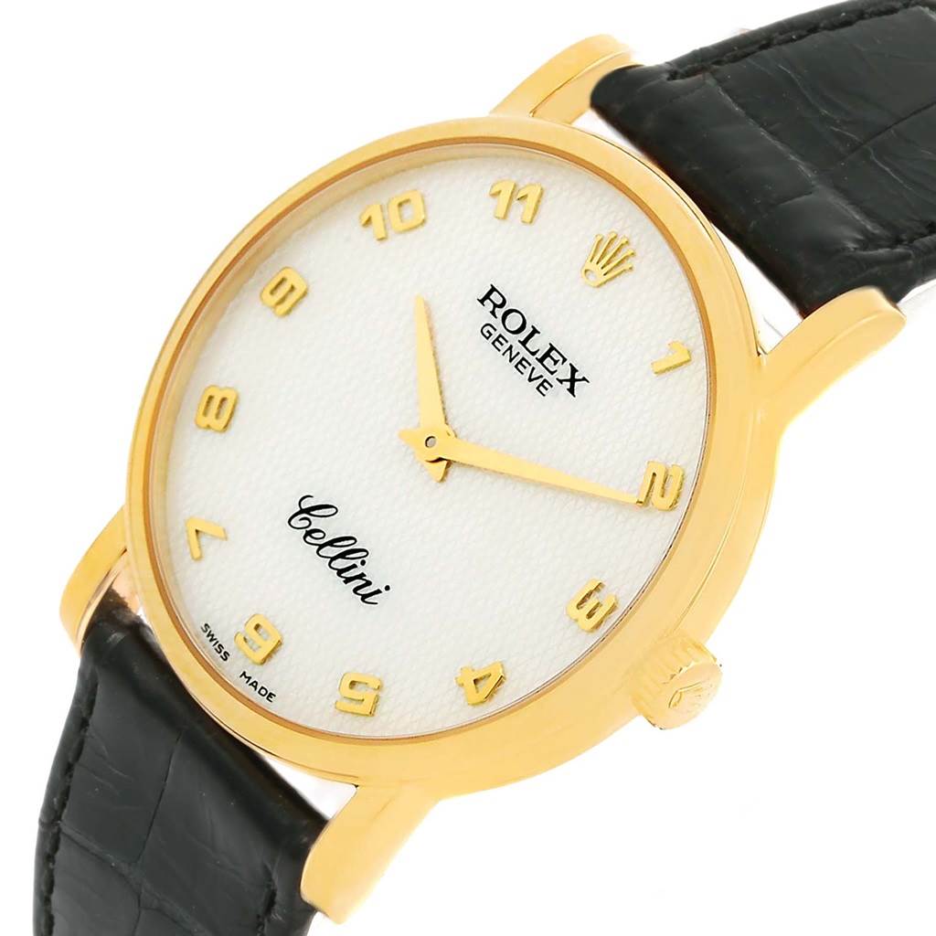 This Rolex Cellini 5115 Men's Yellow Gold Mother of Pearl Dial 5115 Men's Yellow Gold Mother of Pearl Dial watch is shown from a slightly angled top view, highlighting the face, hands, numerals, and part of the black leather strap.