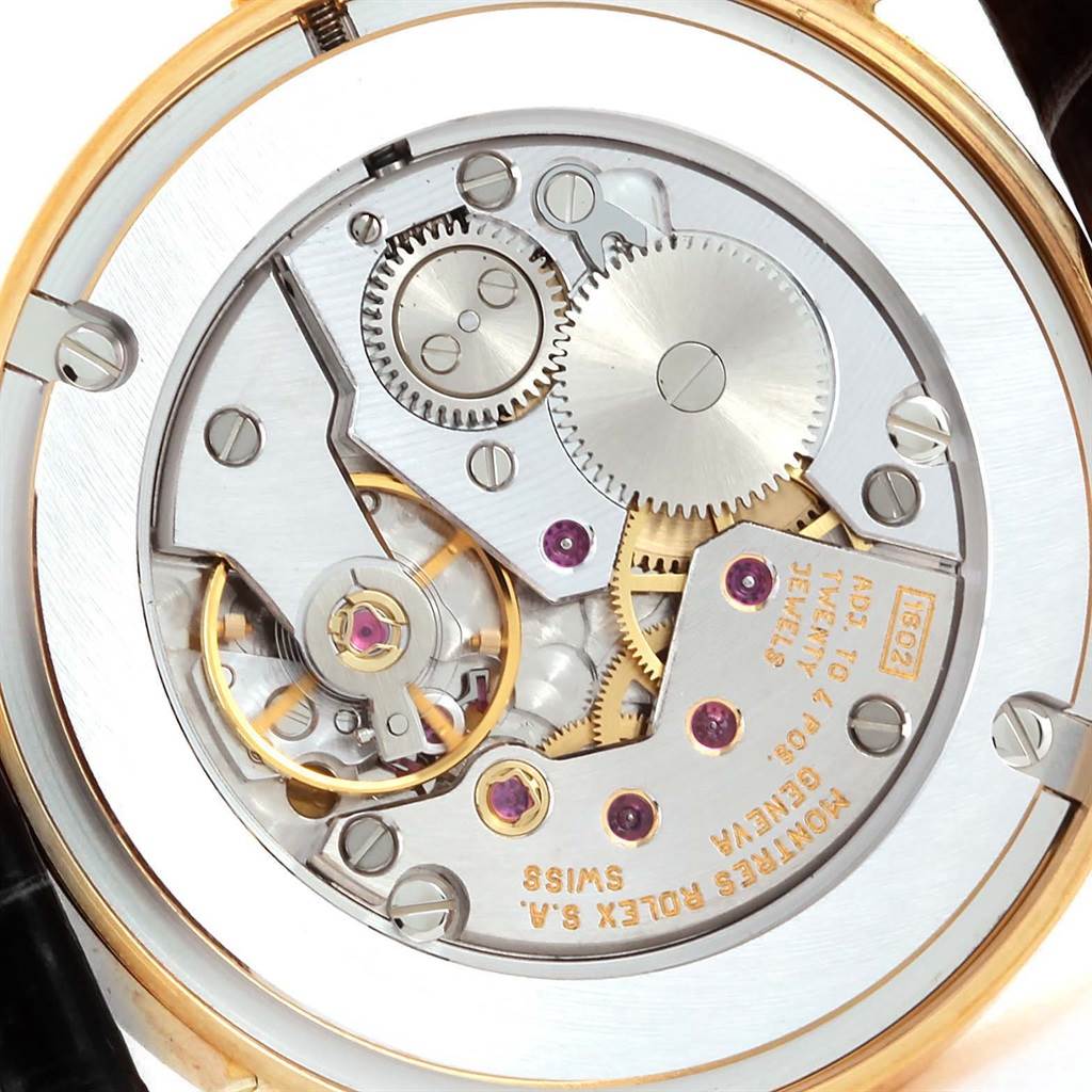 The image shows the intricate internal mechanism of the Rolex Cellini 5115 Men's Yellow Gold Mother of Pearl Dial 5115 Men's Yellow Gold Mother of Pearl Dial watch, viewed from the rear.