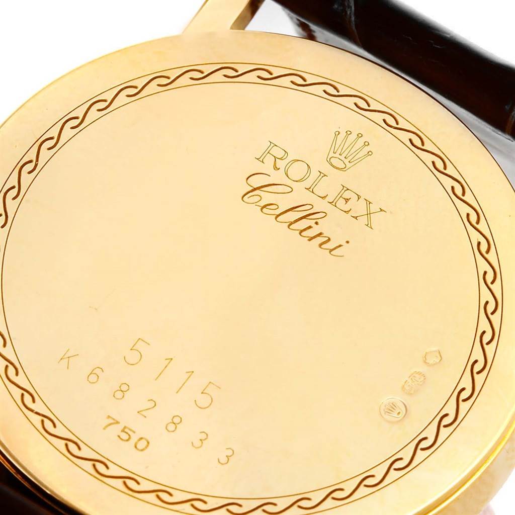 This is a close-up of the back case of a Rolex Cellini 5115 Men's Yellow Gold Mother of Pearl Dial 5115 Men's Yellow Gold Mother of Pearl Dial watch, displaying the model number and engraved details.