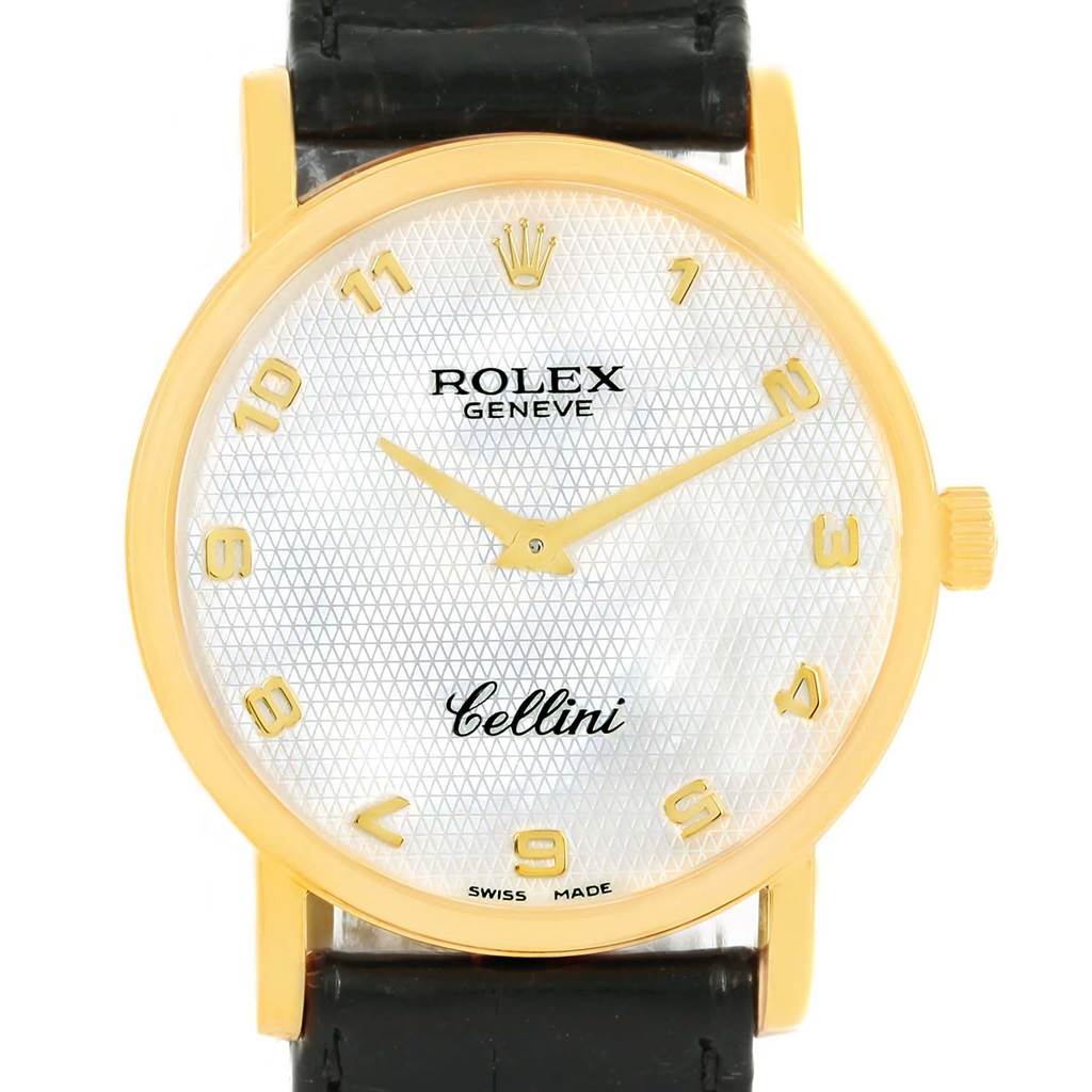 The image shows a front view of a Rolex Cellini 5115 Men's Yellow Gold Mother of Pearl Dial 5115 Men's Yellow Gold Mother of Pearl Dial watch with a white textured dial, gold markers, and a black leather strap.