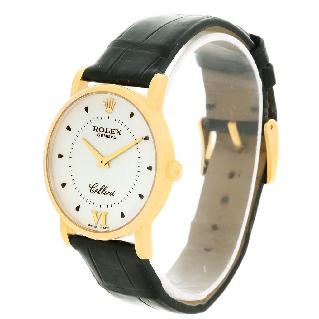 The Rolex Cellini 5115 Men
s Yellow Gold Silver Dial 5115 Men
s Yellow Gold Silver Dial watch is shown at a three-quarter angle, displaying the face, crown, and black leather strap.