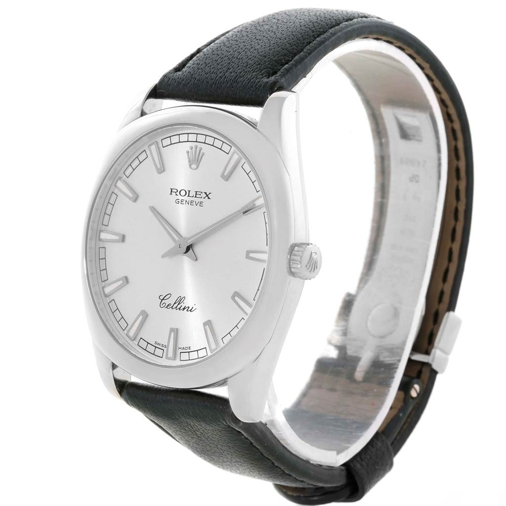 The Rolex Cellini 4243 Men's White Gold Silver Dial 4243 Men's White Gold Silver Dial watch is shown from a slightly angled front view, displaying the dial, hands, case, and leather strap.