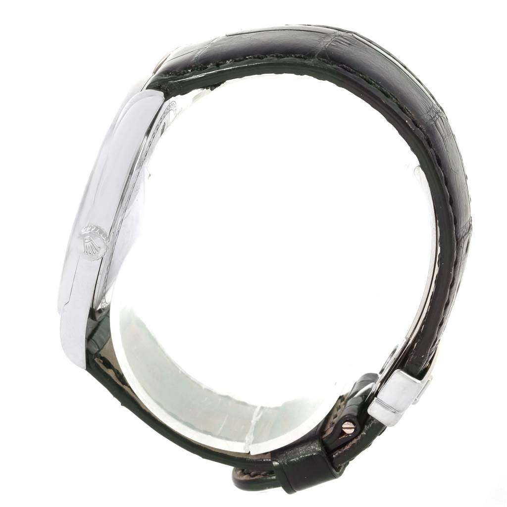 The image shows a side view of the Rolex Cellini 4243 Men's White Gold Silver Dial 4243 Men's White Gold Silver Dial watch, highlighting its crown and leather strap.