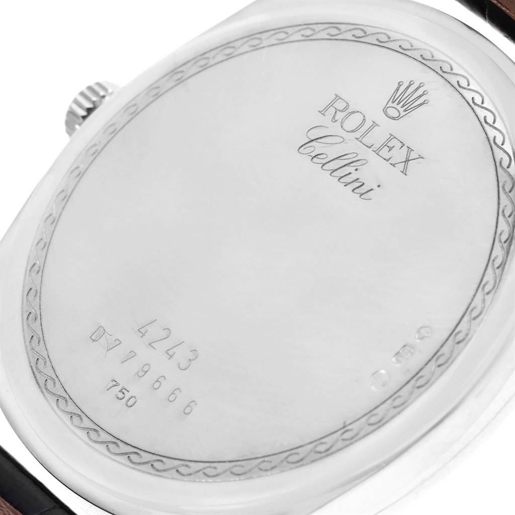 The image shows a close-up of the back case of a Rolex Cellini 4243 Men's White Gold Silver Dial 4243 Men's White Gold Silver Dial watch, featuring its model details and branding.