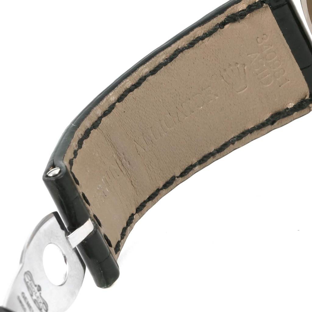 This image shows an angled view of the leather strap and folding clasp of a Rolex Cellini 4243 Men's White Gold Silver Dial 4243 Men's White Gold Silver Dial watch.