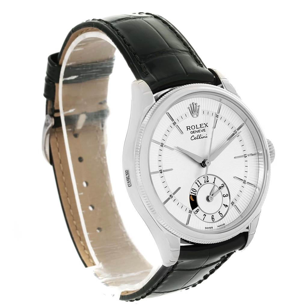 The Rolex Cellini 50529 Men's White Gold Silver Dial 50529 Men's White Gold Silver Dial watch is shown at a slight angle, displaying its leather strap, watch face, and side of the case.