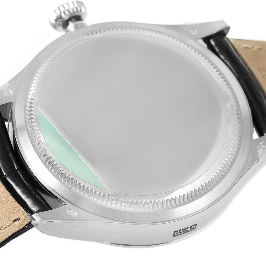 The image shows the back casing and crown of a Rolex Cellini 50529 Men's White Gold Silver Dial 50529 Men's White Gold Silver Dial watch, focusing on its metal detailing and leather strap ends.