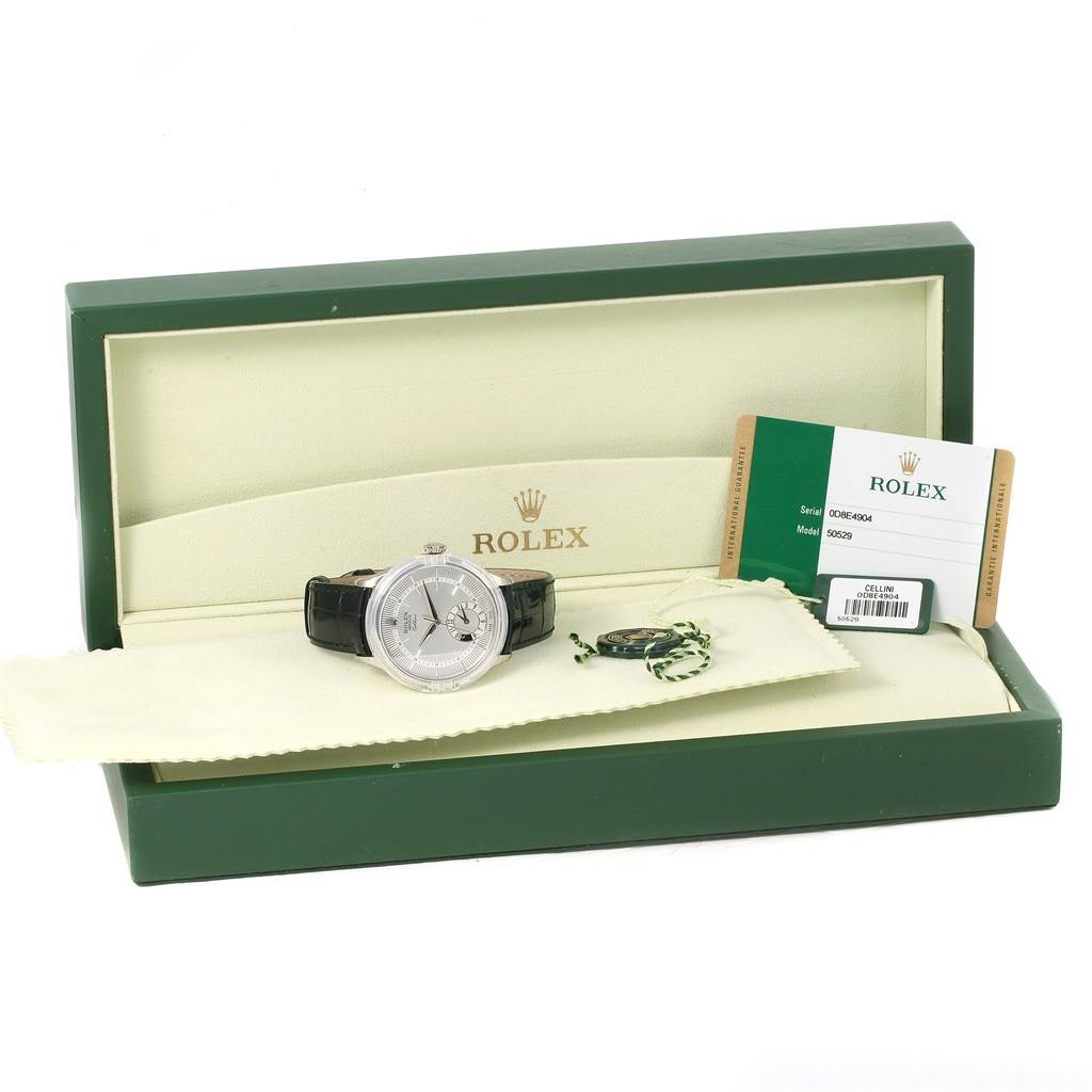 The Rolex Cellini 50529 Men's White Gold Silver Dial 50529 Men's White Gold Silver Dial watch is displayed front-on in its open box with accompanying accessories and certificate.