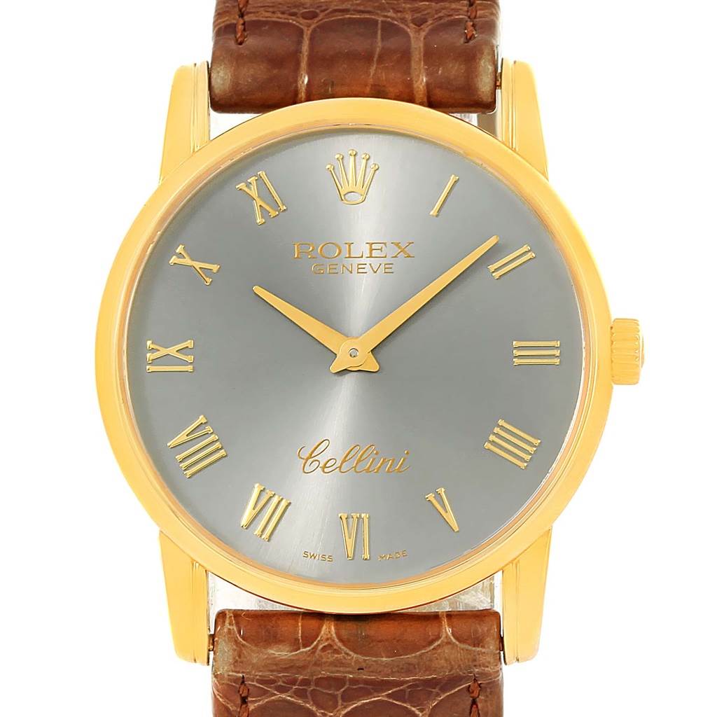 This image shows a front view of a Rolex Cellini 5116 Men's Yellow Gold Grey Dial 5116 Men's Yellow Gold Grey Dial watch, displaying its face, hands, and part of its brown leather strap.