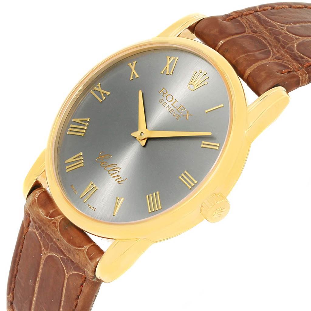 This image shows a Rolex Cellini 5116 Men's Yellow Gold Grey Dial 5116 Men's Yellow Gold Grey Dial watch from a front angle, highlighting its gold case, brown leather strap, and gray dial with Roman numerals.