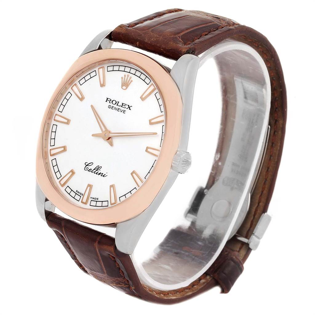 The Rolex Cellini 4243 Men's White Gold White Dial 4243 Men's White Gold White Dial watch is shown at an angled view, displaying its face, case, crown, and brown leather strap.