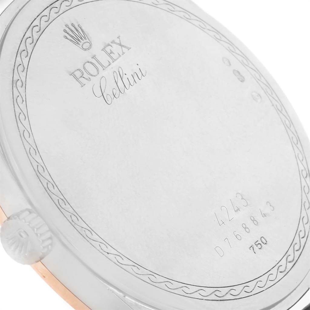 The image shows the back case of a Rolex Cellini 4243 Men's White Gold White Dial 4243 Men's White Gold White Dial watch, including the crown and engraved details.