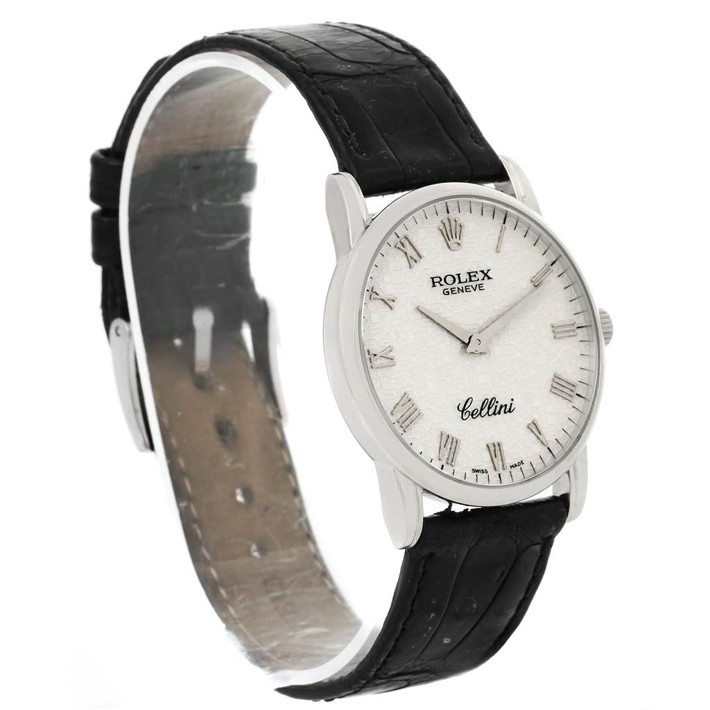 The image shows a Rolex Cellini 5116 Men
s White Gold Silver Dial 5116 Men
s White Gold Silver Dial watch at a three-quarter right angle, highlighting the dial, bezel, and black leather strap.