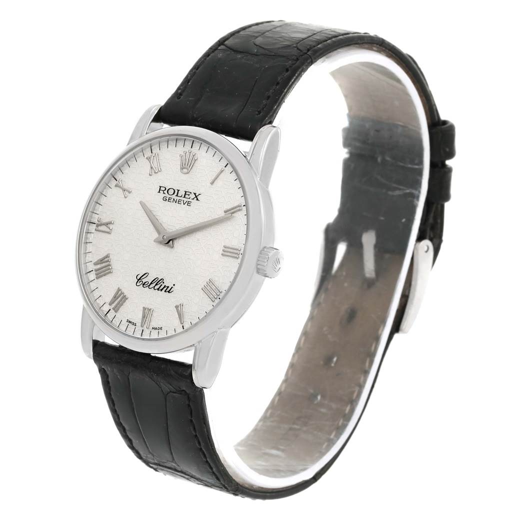 The image shows a side angle view of a Rolex Cellini 5116 Men
s White Gold Silver Dial 5116 Men
s White Gold Silver Dial watch, highlighting its face, strap, and crown.