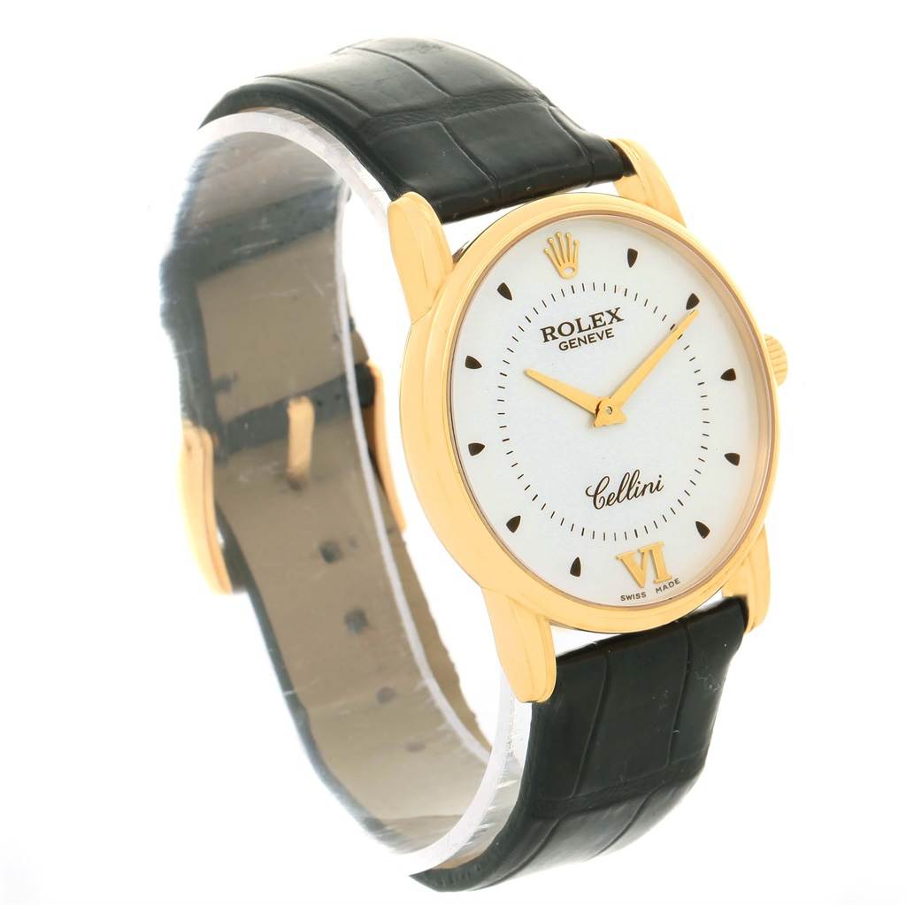 The image shows a side and front angle of a Rolex Cellini 5116 Men's Yellow Gold Silver Dial 5116 Men's Yellow Gold Silver Dial watch, highlighting its face, strap, and gold case.