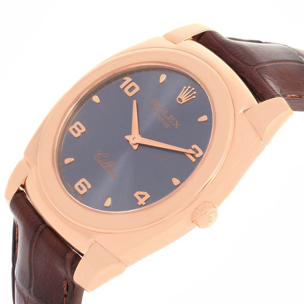 The Rolex Cellini 5330 Men's Rose Gold Grey Dial 5330 Men's Rose Gold Grey Dial watch is shown at an angled view, displaying the face, case, crown, and part of the leather strap.