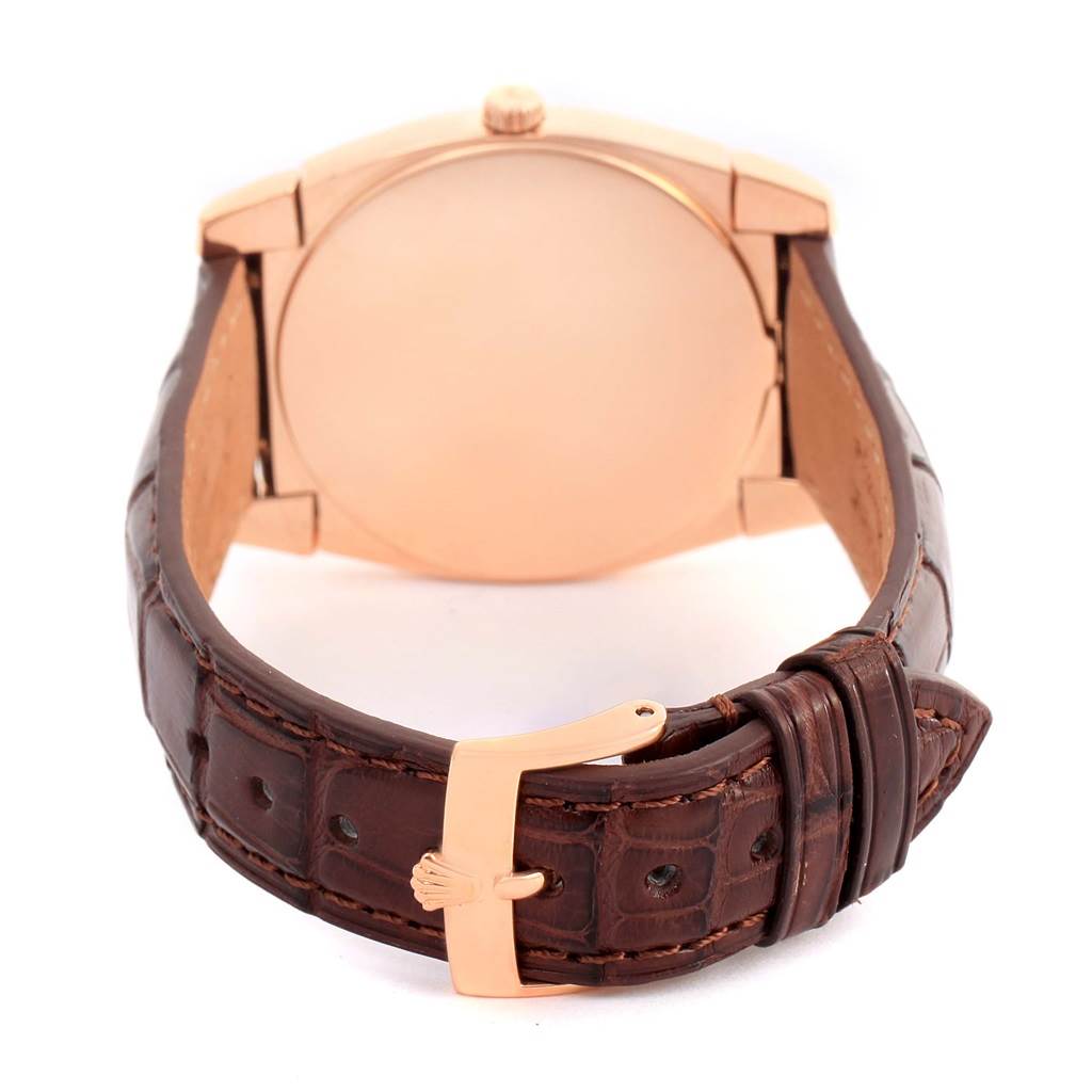 The image shows the back of a Rolex Cellini 5330 Men's Rose Gold Grey Dial 5330 Men's Rose Gold Grey Dial watch, featuring the case back, crown, and brown leather strap with a gold buckle.