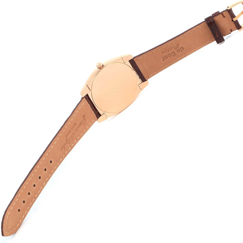 The image shows the back of a Rolex Cellini 5330 Men's Rose Gold Grey Dial 5330 Men's Rose Gold Grey Dial watch with its leather strap fully extended.