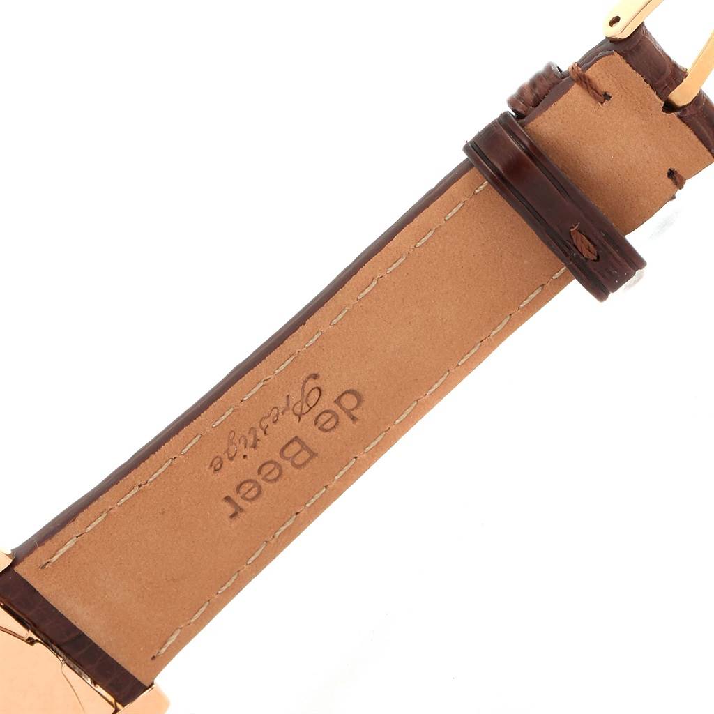 The image shows the inner side of the leather strap and buckle of a Rolex Cellini 5330 Men's Rose Gold Grey Dial 5330 Men's Rose Gold Grey Dial watch.