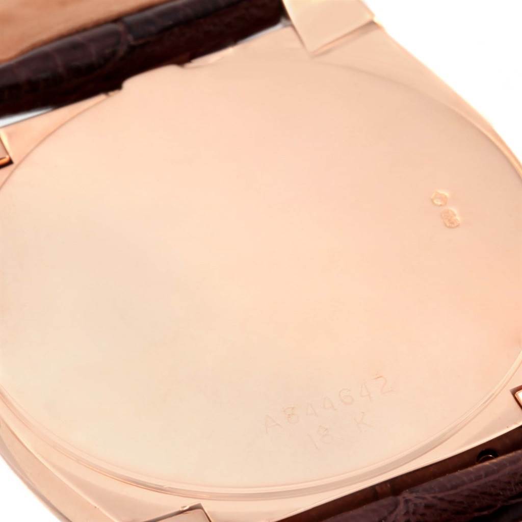 The image shows the back case of a Rolex Cellini 5330 Men's Rose Gold Grey Dial 5330 Men's Rose Gold Grey Dial watch, emphasizing its polished finish and engravings.