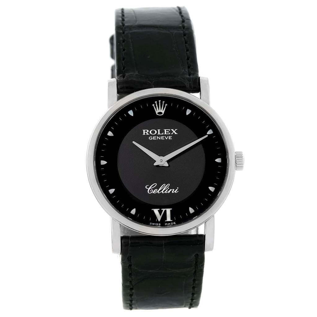 The Rolex Cellini 5115 Men's White Gold Black Dial 5115 Men's White Gold Black Dial watch is shown from the front, displaying its black dial, silver hands, bezel, and black leather strap.