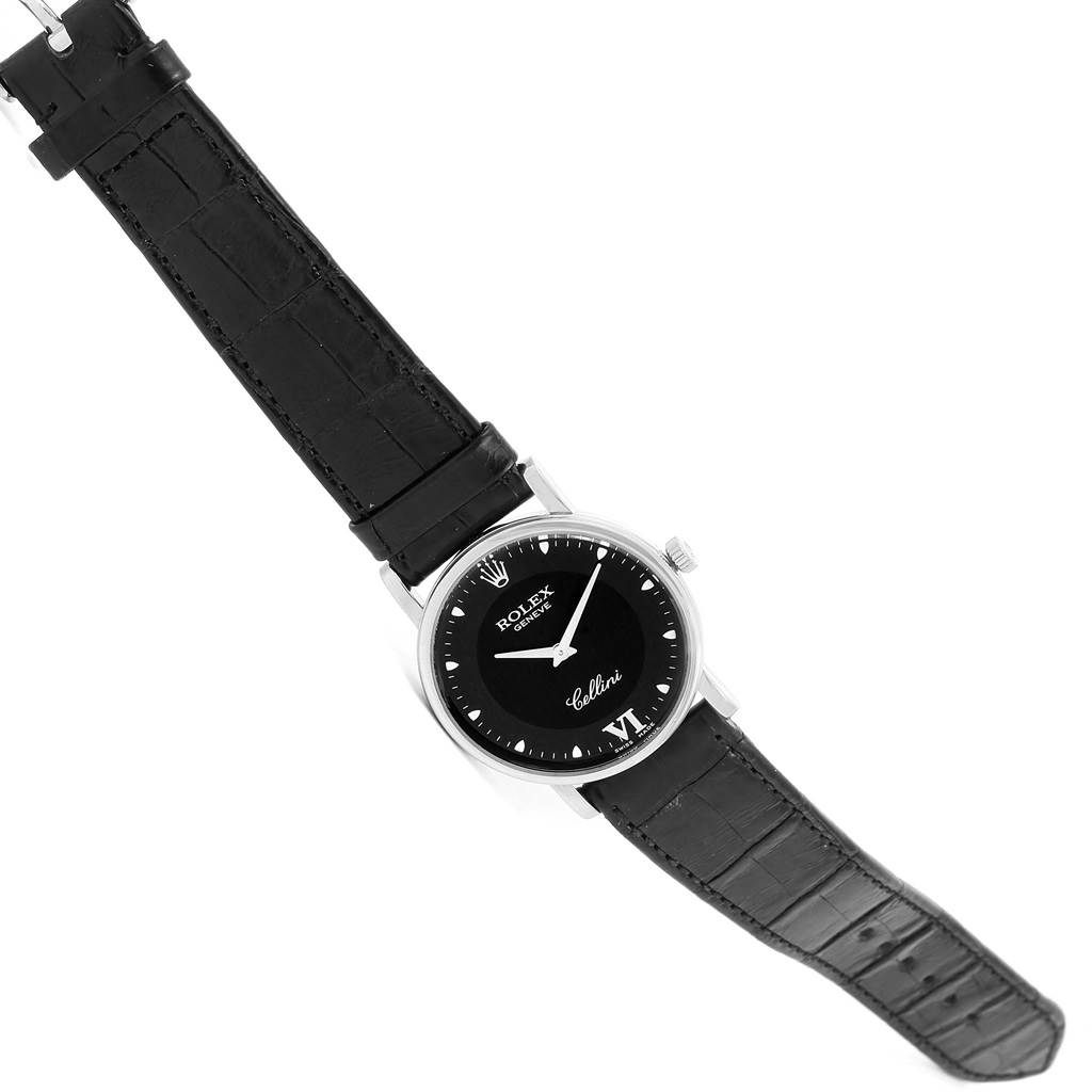 The image shows a top view of a Rolex Cellini 5115 Men's White Gold Black Dial 5115 Men's White Gold Black Dial watch featuring a black leather strap and a black dial.