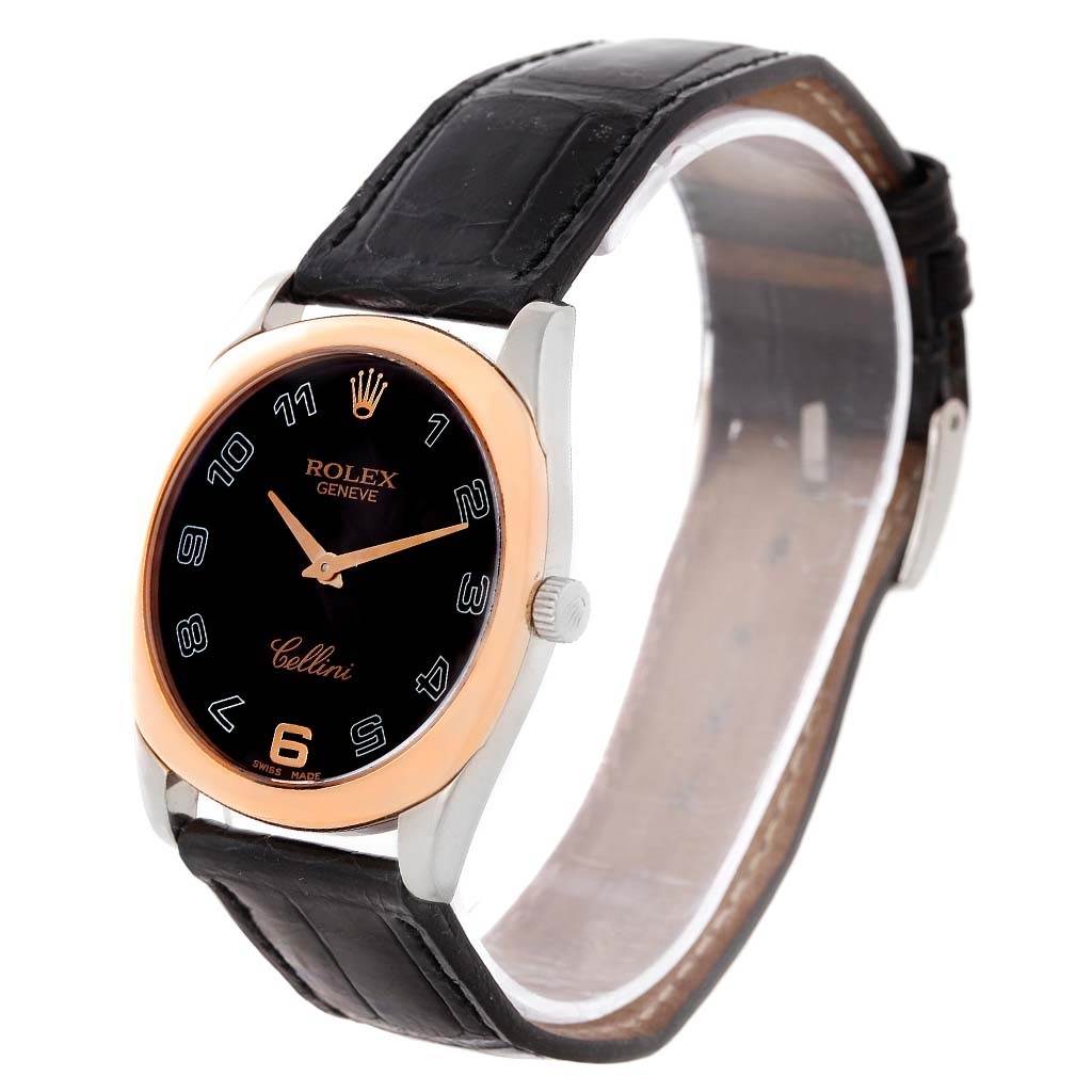 The image shows a Rolex Cellini 4233 Men's White Gold Black Dial 4233 Men's White Gold Black Dial watch from an angled view, featuring its black dial, rose gold bezel, and black leather strap.