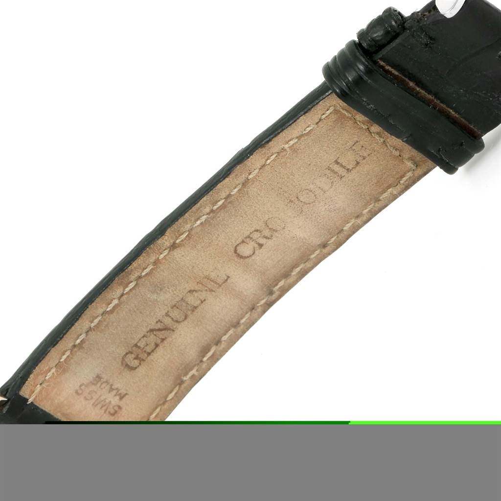 The image shows a close-up of the leather strap of a Rolex Cellini 4233 Men's White Gold Black Dial 4233 Men's White Gold Black Dial watch, highlighting the inside inscription and stitching details.