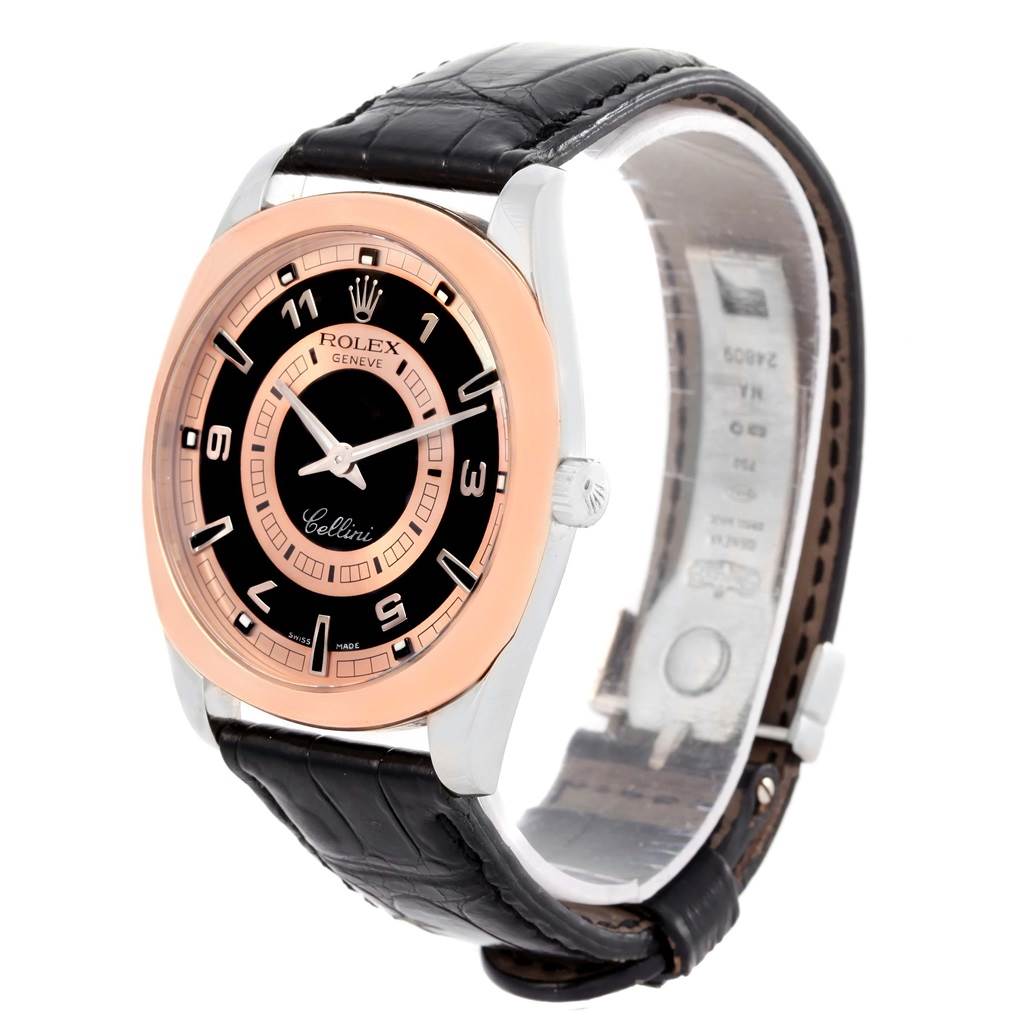The image shows a Rolex Cellini 4243 Men
s White Gold Black Dial 4243 Men
s White Gold Black Dial watch at a slight angle, highlighting its black dial, rose gold bezel, and black leather strap.