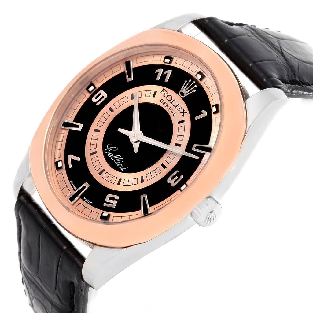 This image shows a close-up of the Rolex Cellini 4243 Men
s White Gold Black Dial 4243 Men
s White Gold Black Dial watch, highlighting the black and rose gold dial, silver hands, and black leather strap.